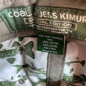 A flat brim on the Coal Angler Jess Kimura Special Edition Snapback hat.